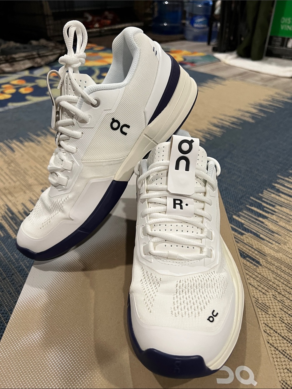 On Cloud Roger Pro women’s  Sneakers in White with Navy Detailing